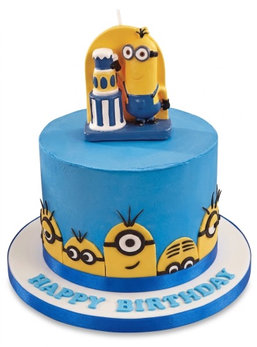 Round blue Minions birthday cake with Minion faces and a Minion character candle on top.