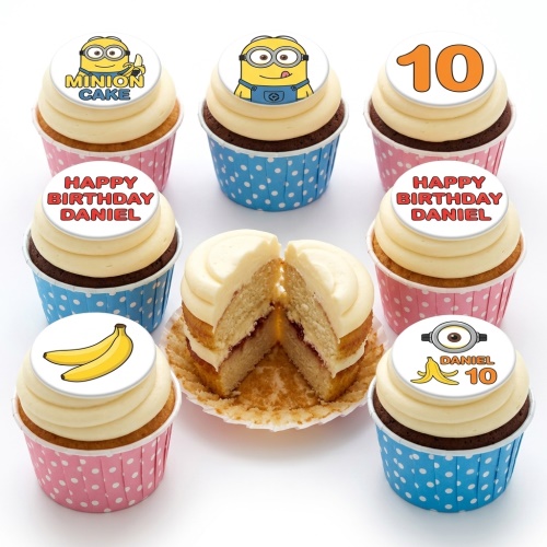 Minion themed birthday cupcakes with yellow characters, bananas, and custom age toppers in blue and pink cases.