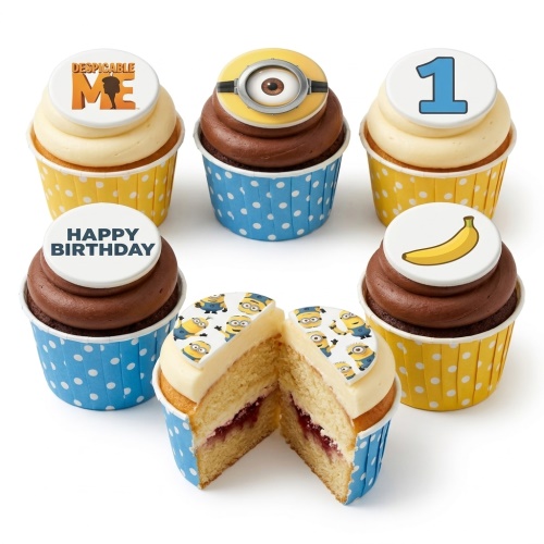 Minions themed birthday cupcakes with yellow and blue cases, topped with Minions characters, Despicable Me logo, banana, and a custom age topper.