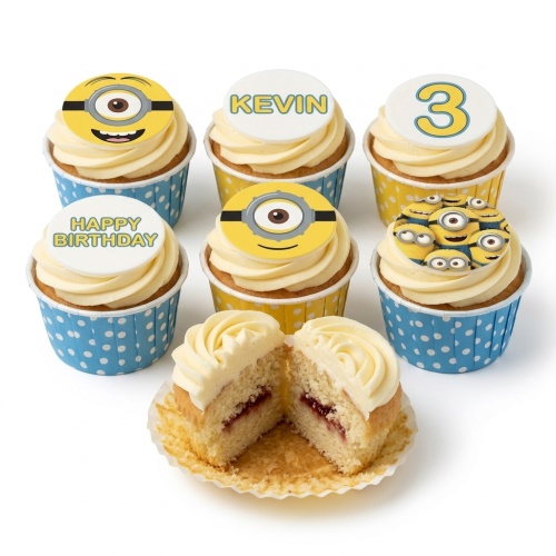Minions themed cupcakes with yellow and blue frosting, featuring custom age and message toppers.