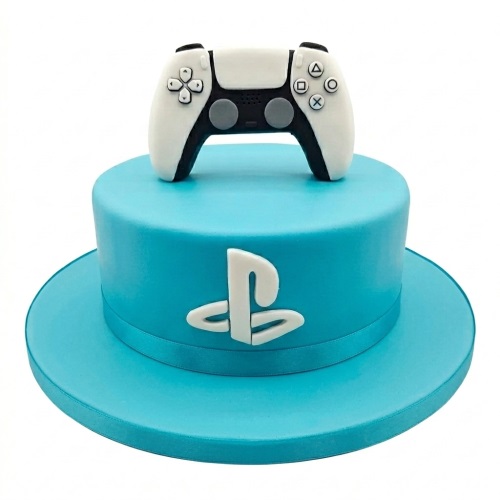 Blue round PS5 gaming birthday cake with white PlayStation 5 controller topper and logo.