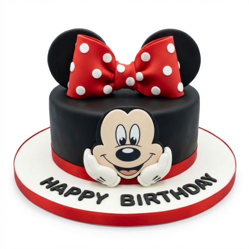 Round black Minnie Mouse birthday cake with red polka dot bow and "Happy Birthday" message.