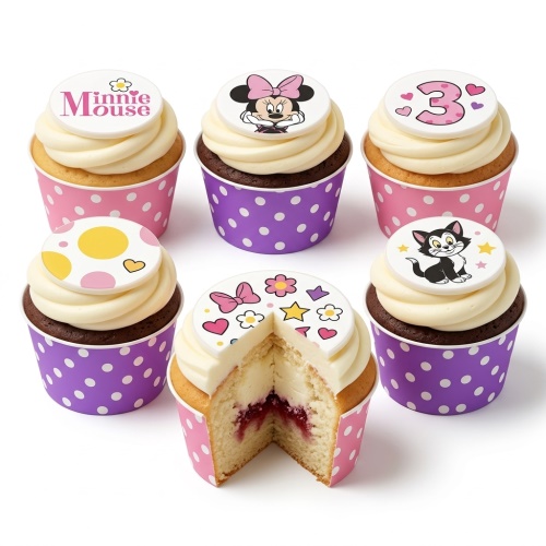 Minnie Mouse and Figaro themed cupcakes with pink and purple polka dot cases, piped white frosting, and edible toppers including a number 3.