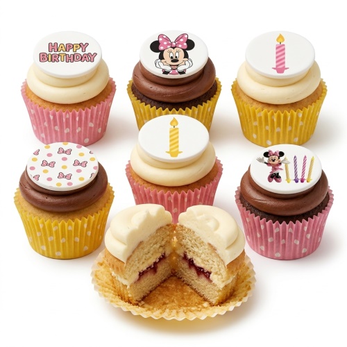 Minnie Mouse themed birthday cupcakes with vanilla and chocolate frosting, decorated with character toppers, bows, and candles.