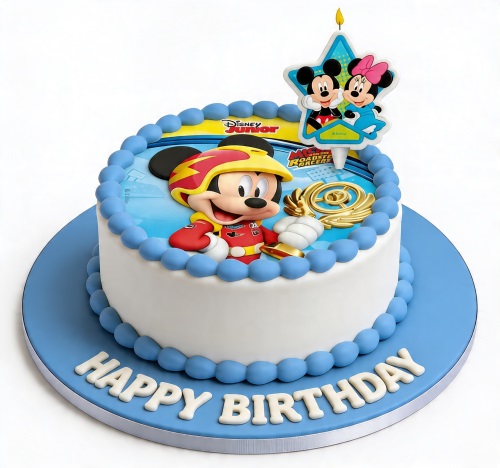 Round white cake with Mickey Mouse Roadster Racers edible image, blue beaded border, and Mickey and Minnie candle topper.