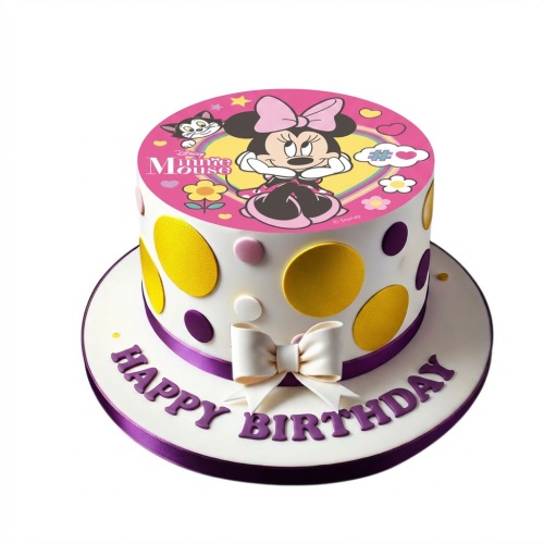 Round white Minnie Mouse birthday cake with pink topper, yellow and purple polka dots, and a white bow.