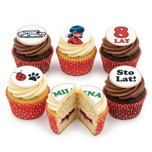 Miraculous Ladybug themed cupcakes with character toppers, ladybug, paw print, and custom age example.