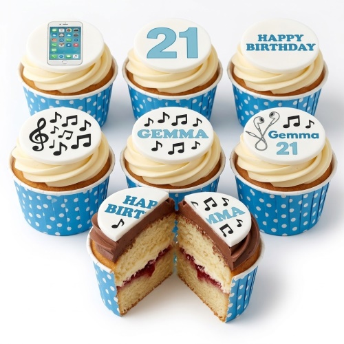 Vanilla cupcakes with music notes, smartphone, and custom age/message toppers in blue polka dot cases.