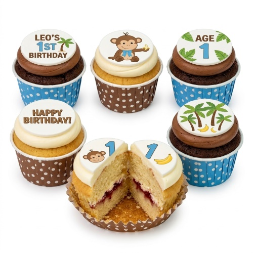 Six monkey and palm tree 1st birthday cupcakes in blue and brown cases