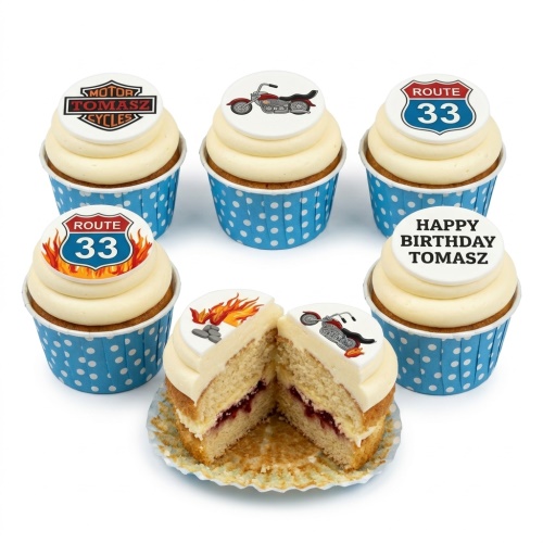 Motorcycle themed cupcakes with classic motorbike, route sign, and custom message toppers in blue polka dot cases.