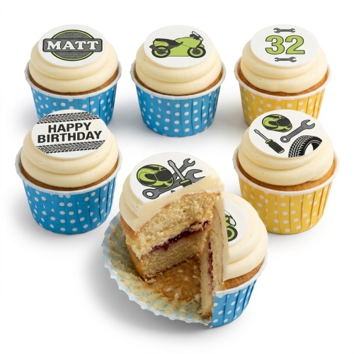 Cupcakes with motorbike, helmet, tools, tire tread, and custom age/name toppers in blue and yellow cases.