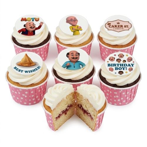 Motu Patlu themed cupcakes with white frosting and edible character toppers. Some cupcakes have 'Birthday Boy!' and 'Best Wishes!' messages.