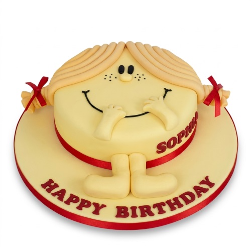 Round yellow character birthday cake with a smiling face, blonde pigtails, red bows, and a red ribbon. The cake has a custom name and 'Happy Birthday' message.