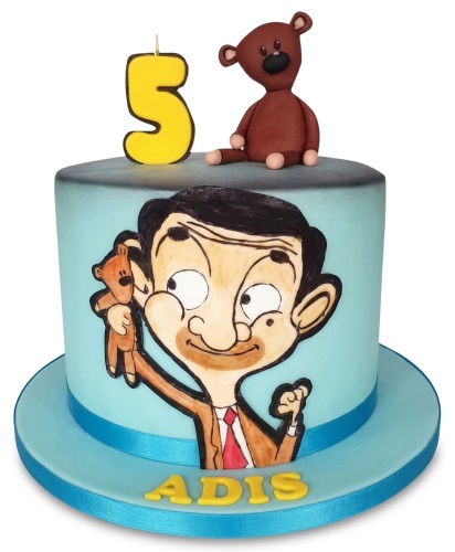 Round light blue Mr Bean birthday cake with 3D Teddy bear and custom age candle.
