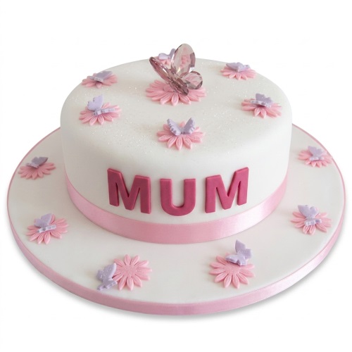 White round cake with pink 'MUM' lettering, decorated with pink flowers and purple butterflies.