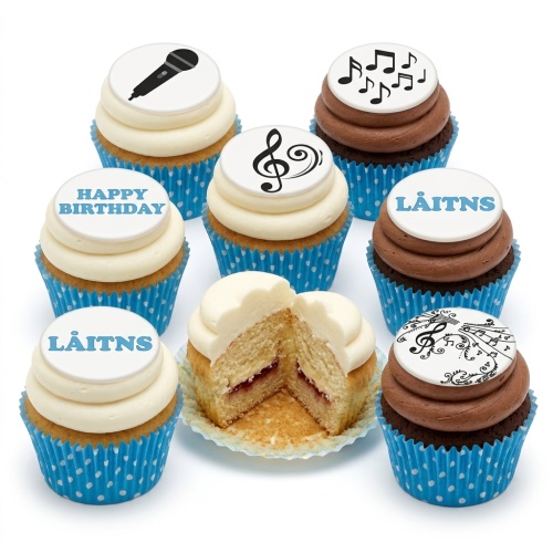 Assortment of music theme birthday cupcakes with microphone, musical notes, and treble clef toppers.