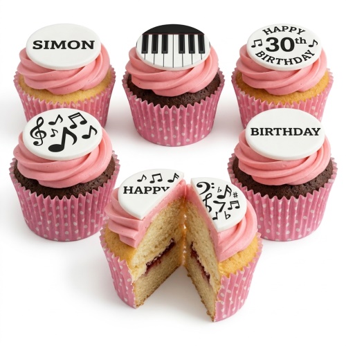 Music themed cupcakes with piano keys and musical notes, featuring custom age and name toppers on pink frosted cupcakes.