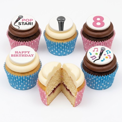 Vanilla and chocolate cupcakes with pop star, microphone, musical notes, and custom age toppers
