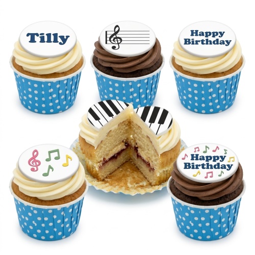 Assorted cupcakes with music theme toppers including musical notes, treble clef, piano keys, and 'Happy Birthday' message.