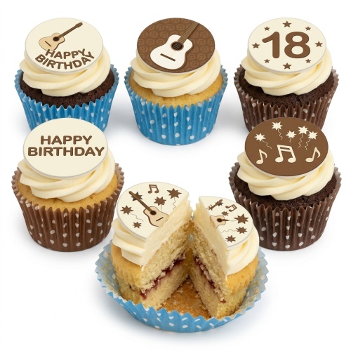Selection of music themed birthday cupcakes with white frosting and edible toppers featuring guitars, musical notes, stars, and 'Happy Birthday' text.
