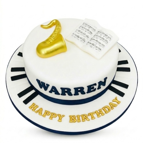 White music theme birthday cake with golden saxophone, sheet music, and piano keys.