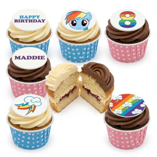 My Little Pony and rainbow themed birthday cupcakes with custom age and name toppers, in pink and blue polka dot wrappers.