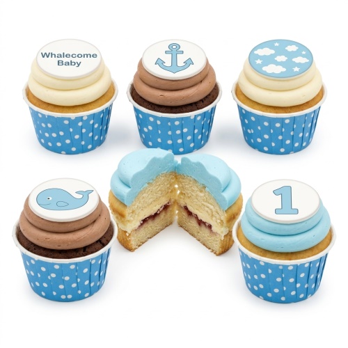 Blue and white baby shower cupcakes with whale, anchor, clouds, and custom age topper.