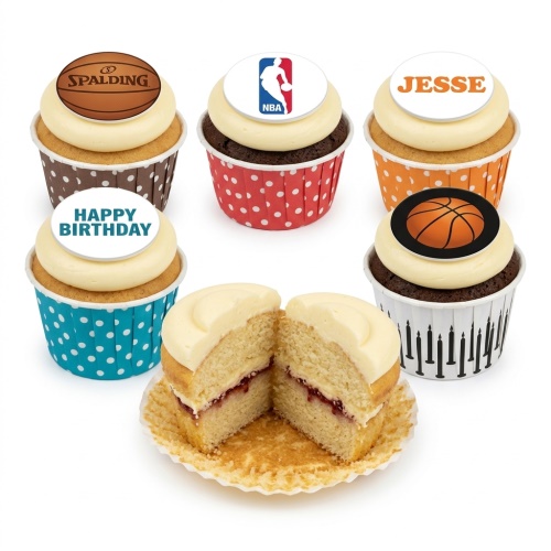 Basketball themed cupcakes with NBA, Spalding, and generic basketball toppers, plus a 'Happy Birthday' message.