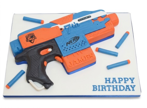 Nerf Stryfe blaster shaped birthday cake with blue and orange foam darts, custom age and name