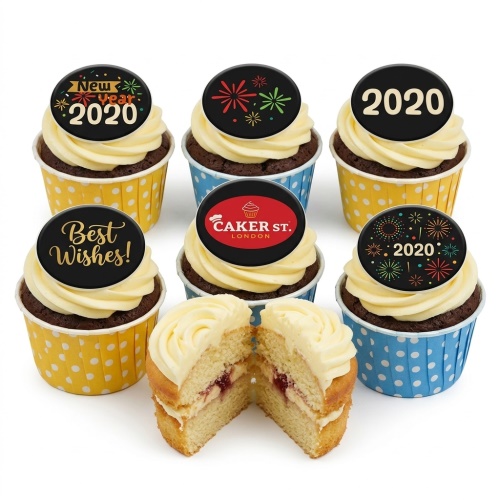New Year 2020 cupcakes with fireworks and 'Best Wishes' toppers in yellow and blue cases, one cut to show jam filling.