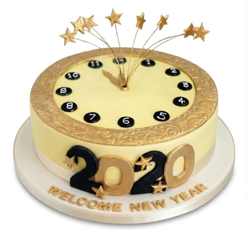 Round New Year cake with clock face, golden stars, and 'Welcome New Year' message.