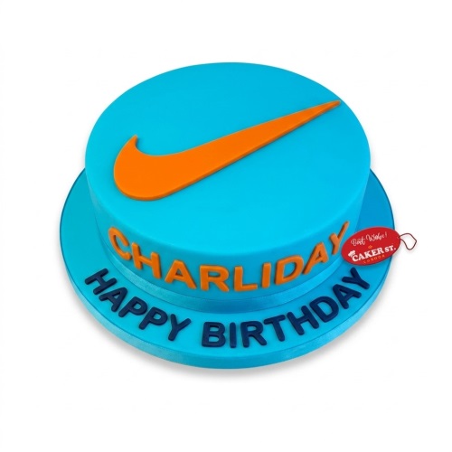 Round blue birthday cake with an orange Nike swoosh and custom message.