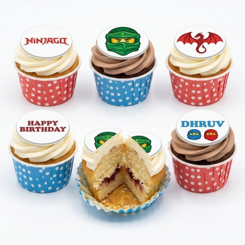 Ninjago themed birthday cupcakes with ninja faces, dragon, and custom message toppers.