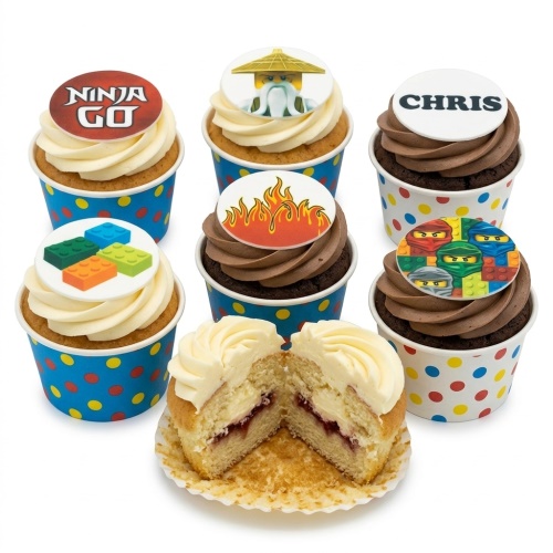 Assortment of Ninjago and building block themed cupcakes with vanilla and chocolate frosting in polka dot wrappers.