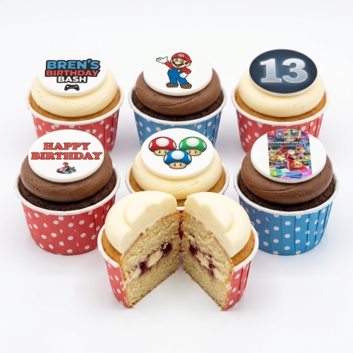 Super Mario themed cupcakes with Mario, mushrooms, and Mario Kart toppers for a custom age birthday.