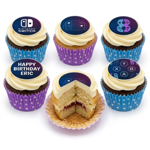 Set of six Nintendo Switch themed cupcakes with white frosting, blue and purple wrappers, and gaming edible toppers.