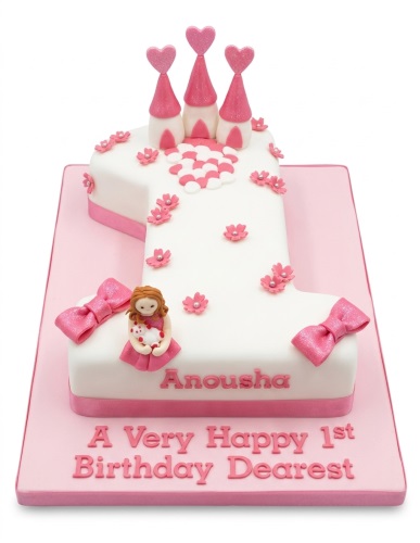 White number one shaped cake with pink castle turrets, bows, flowers, and a girl figure for a 1st birthday.