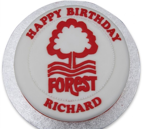 Round white birthday cake with red Nottingham Forest club crest and "Happy Birthday" message.