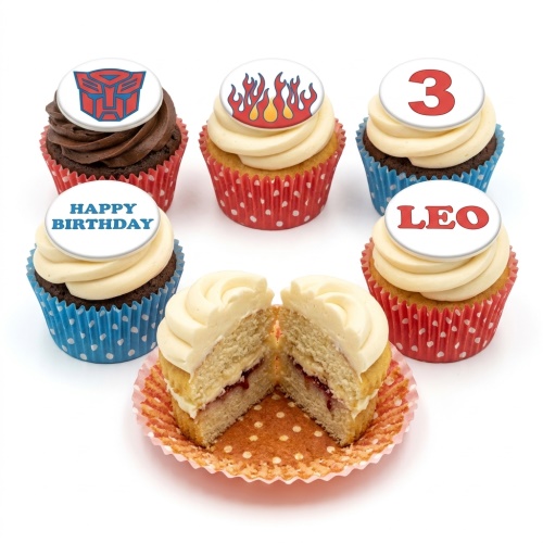 Transformers themed cupcakes with Autobot logo, flames, 'Happy Birthday', and custom age topper.