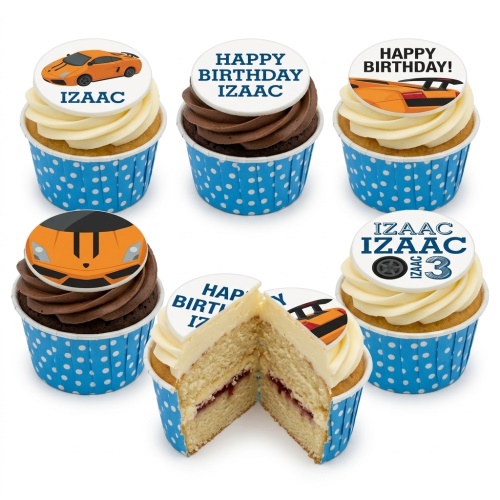 A selection of vanilla and chocolate cupcakes with blue polka dot wrappers, topped with orange sports car designs and 'Happy Birthday' messages.