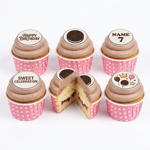 Oreo themed birthday cupcakes with brown frosting, pink polka dot cases, and customisable toppers.