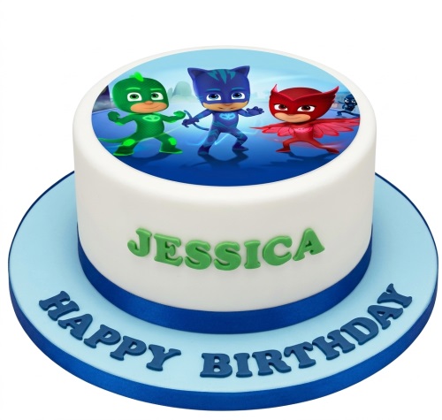 Round white PJ Masks themed birthday cake with Catboy, Owlette, and Gekko edible topper, blue ribbon, and customisable name and message.