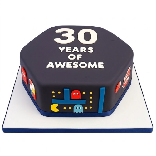 Hexagonal dark grey Pacman retro gaming birthday cake with custom age topper and ghost characters.
