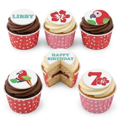 Assortment of tropical theme birthday cupcakes with parrot, hibiscus, and personalised message toppers.