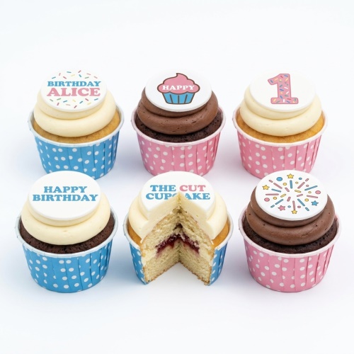 Assortment of personalised birthday cupcakes with custom age and name toppers, sprinkles, and mixed frosting.