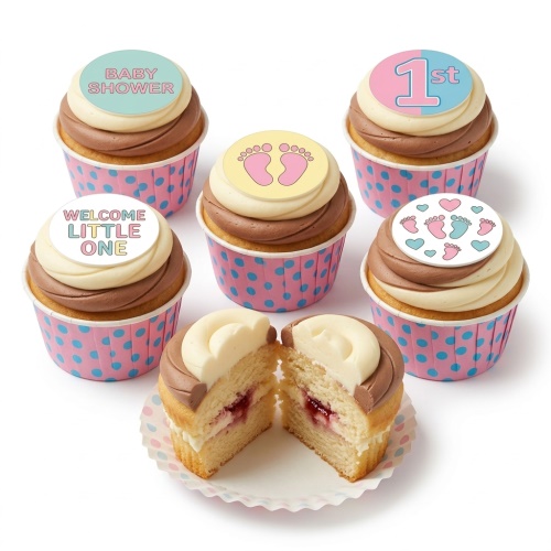 Cupcakes with two-tone frosting, baby footprints, "Baby Shower", "Welcome Little One", and "1st" toppers.
