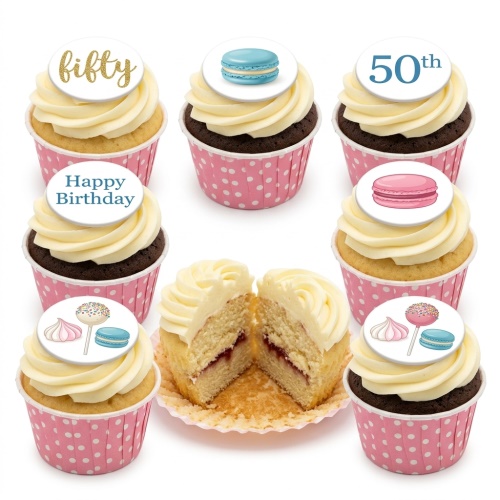 Assortment of vanilla and chocolate cupcakes with white frosting, macaron, cake pop, meringue, and custom age toppers in pink wrappers.