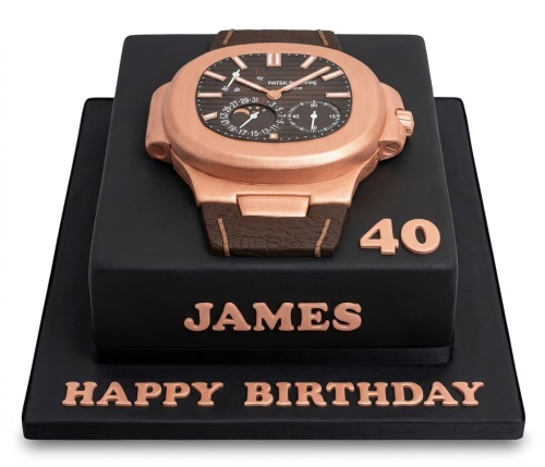 Two-tier black birthday cake with a rose gold Patek Philippe style watch, custom age, and name.