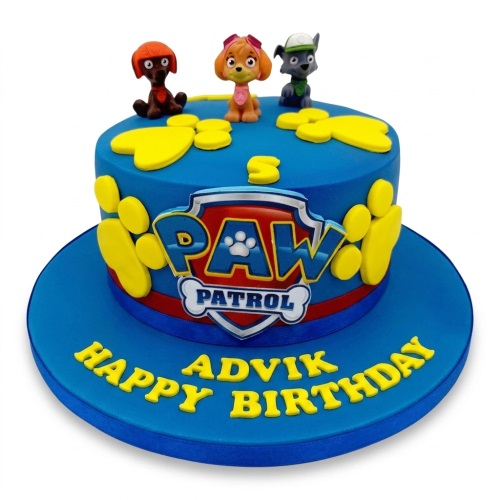 Blue Paw Patrol themed birthday cake with character toppers, paw prints, and custom age '5'.