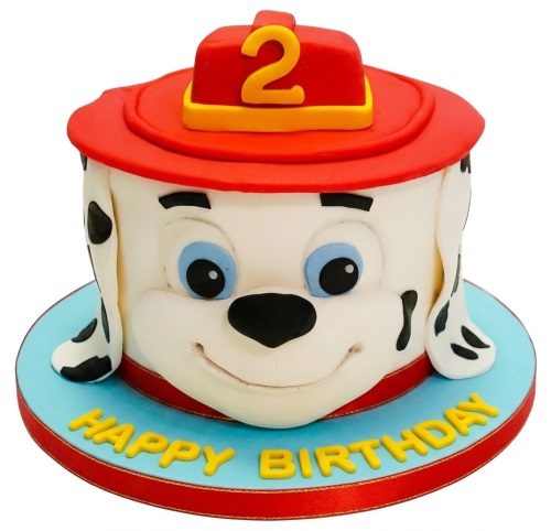 Paw Patrol Marshall character birthday cake with a red fireman's hat and custom age topper.